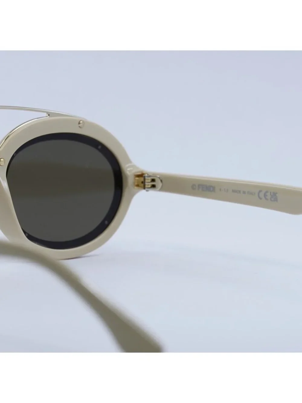 Fendi FE40094I 25E Sunglasses Ivory/Gold Oval Frame, Brown Lenses